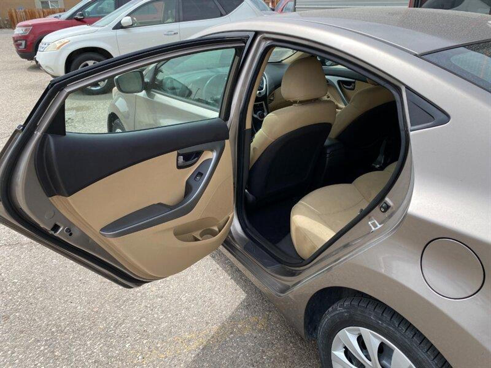 2011 Tan Hyundai ELANTRA GLS (5NPDH4AE5BH) with an 1.8L I4 148hp 131ft. lbs. engine, 6 Speed Manual transmission, located at 842 E South Street, Powell, WY, 82435, (307) 754-7289, 44.752300, -108.746933 - Photo #9