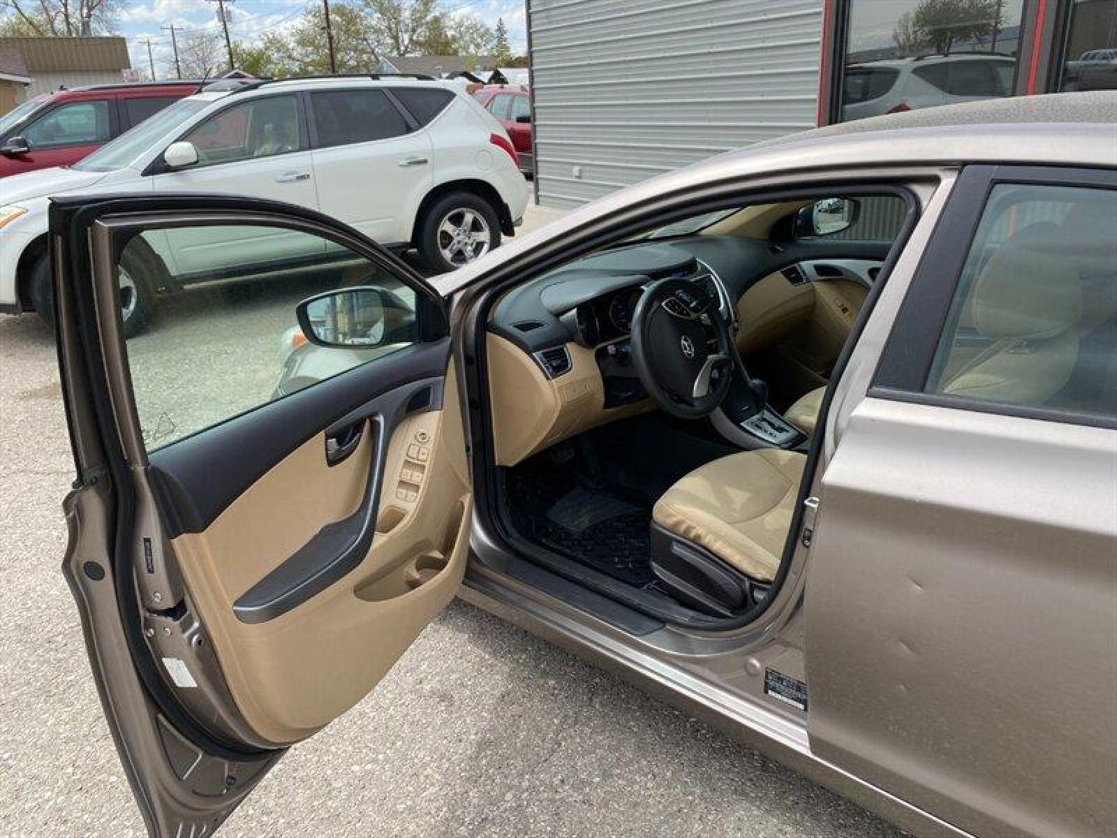 2011 Tan Hyundai ELANTRA GLS (5NPDH4AE5BH) with an 1.8L I4 148hp 131ft. lbs. engine, 6 Speed Manual transmission, located at 842 E South Street, Powell, WY, 82435, (307) 754-7289, 44.752300, -108.746933 - Photo #4