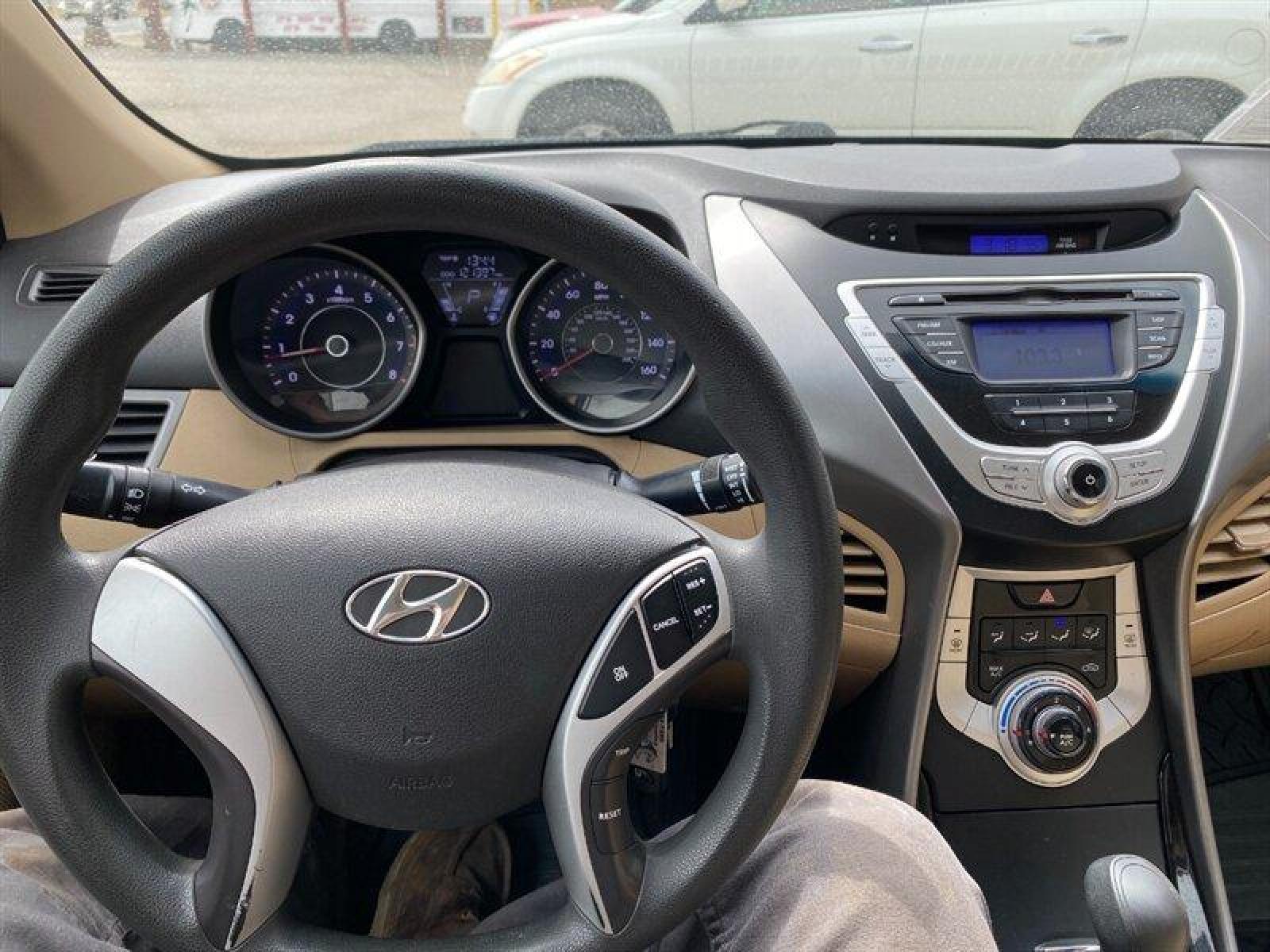 2011 Tan Hyundai ELANTRA GLS (5NPDH4AE5BH) with an 1.8L I4 148hp 131ft. lbs. engine, 6 Speed Manual transmission, located at 842 E South Street, Powell, WY, 82435, (307) 754-7289, 44.752300, -108.746933 - Photo #8