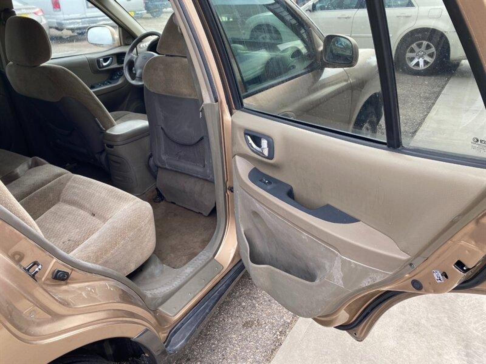 2003 Gold Hyundai SANTA FE (KM8SB12BX3U) with an 2.4L I4 138hp 147ft. lbs. engine, 5 Speed Manual transmission, located at 842 E South Street, Powell, WY, 82435, (307) 754-7289, 44.752300, -108.746933 - Photo #17