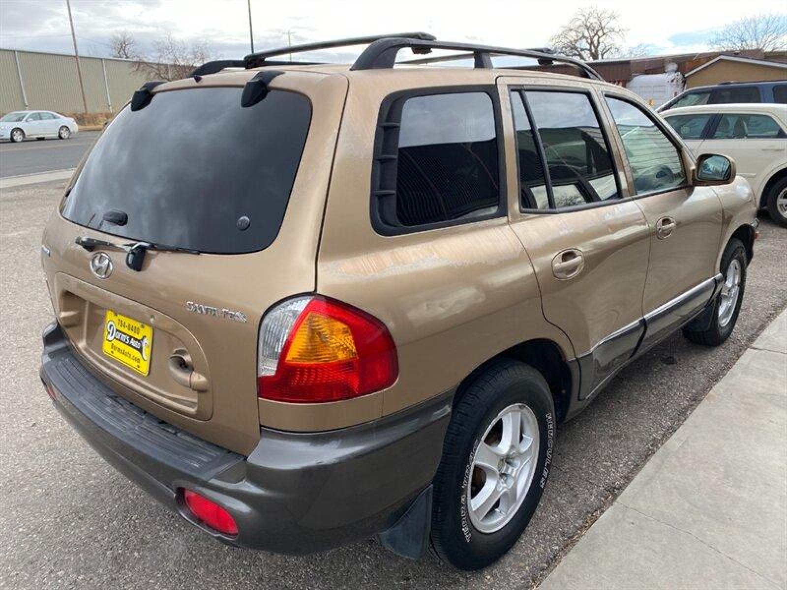 2003 Gold Hyundai SANTA FE (KM8SB12BX3U) with an 2.4L I4 138hp 147ft. lbs. engine, 5 Speed Manual transmission, located at 842 E South Street, Powell, WY, 82435, (307) 754-7289, 44.752300, -108.746933 - Photo #2