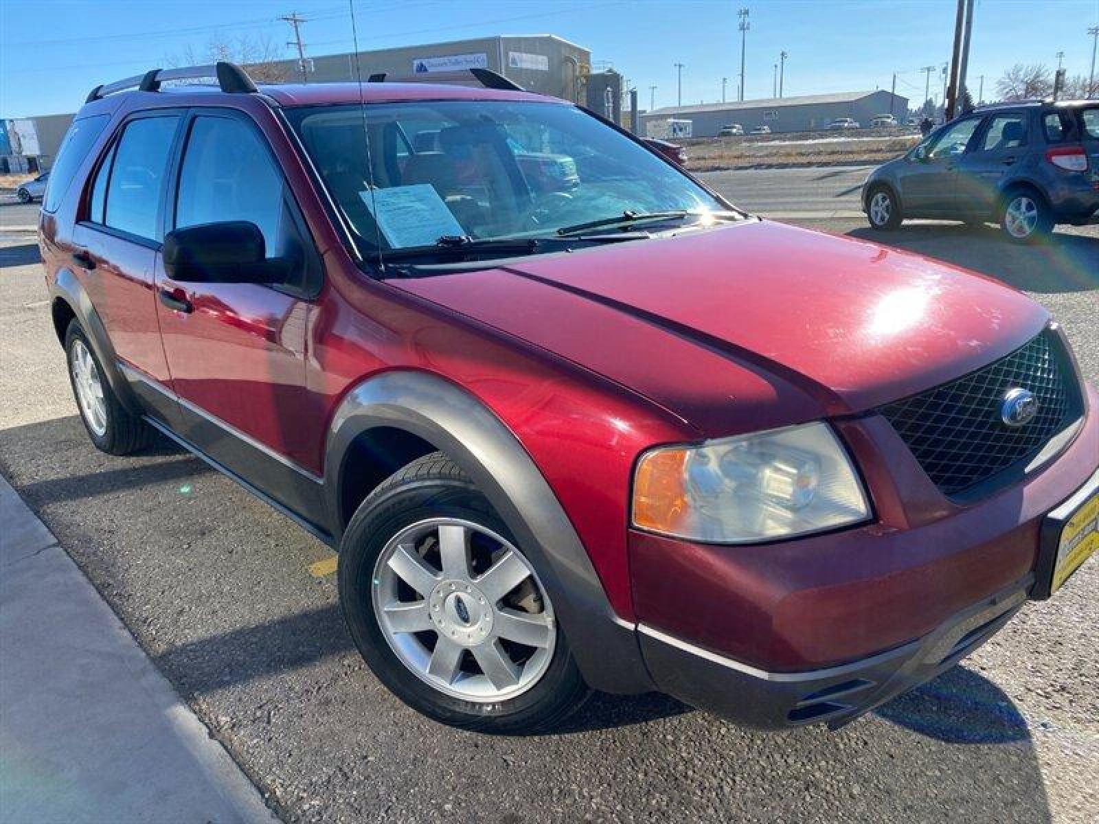 2006 Red Ford Freestyle SE (1FMZK01126G) with an 3.0L V6 203hp 207ft. lbs. engine, Automatic transmission, located at 842 E South Street, Powell, WY, 82435, (307) 754-7289, 44.752300, -108.746933 - Photo #3