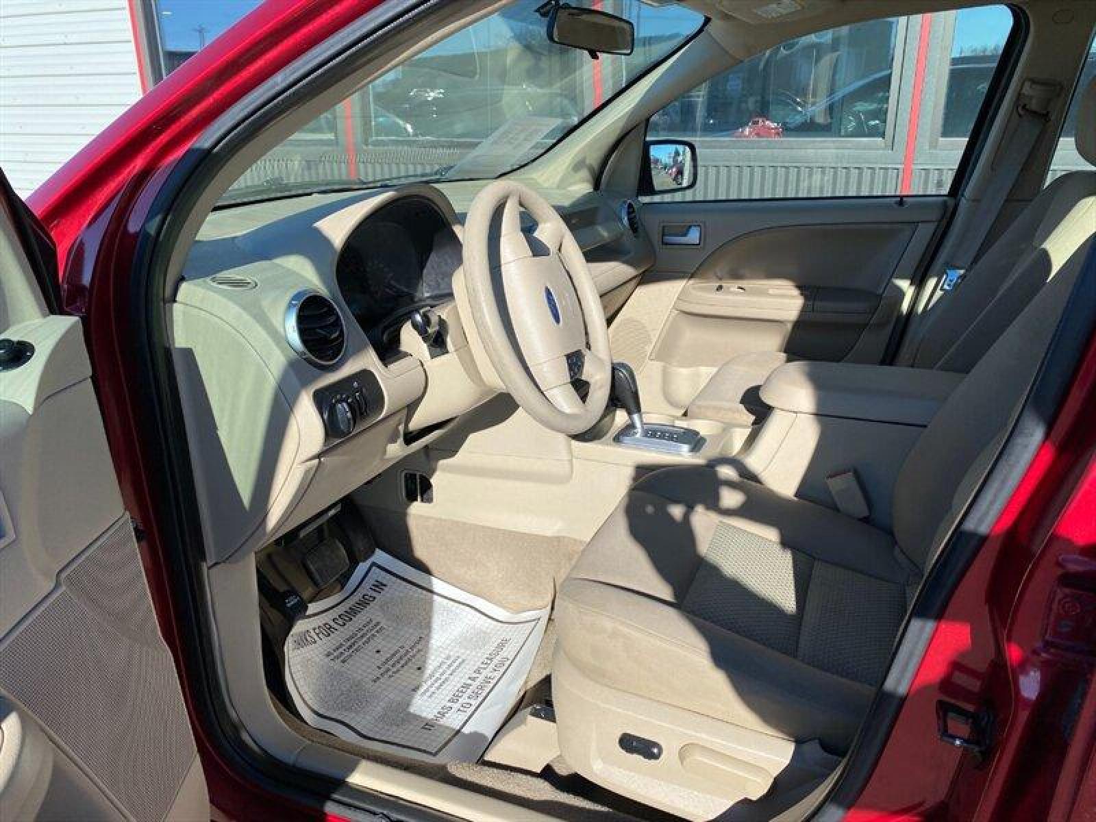 2006 Red Ford Freestyle SE (1FMZK01126G) with an 3.0L V6 203hp 207ft. lbs. engine, Automatic transmission, located at 842 E South Street, Powell, WY, 82435, (307) 754-7289, 44.752300, -108.746933 - Photo #5