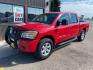 2010 Red Nissan Titan SE (1N6AA0EC2AN) with an 5.6L V8 317hp 385ft. lbs. engine, Automatic transmission, located at 842 E South Street, Powell, WY, 82435, (307) 754-7289, 44.752300, -108.746933 - Photo#0