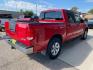 2010 Red Nissan Titan SE (1N6AA0EC2AN) with an 5.6L V8 317hp 385ft. lbs. engine, Automatic transmission, located at 842 E South Street, Powell, WY, 82435, (307) 754-7289, 44.752300, -108.746933 - Photo#2