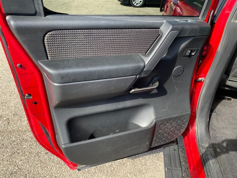 2010 Red Alert Nissan Titan SE (1N6AA0EC2AN) with an 5.6L V8 317hp 385ft. lbs. engine, Automatic transmission, located at 842 E South Street, Powell, WY, 82435, (307) 754-7289, 44.752300, -108.746933- Photo#8