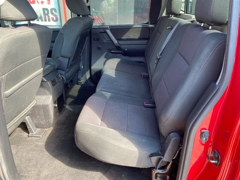 2010 Red Alert Nissan Titan SE (1N6AA0EC2AN) with an 5.6L V8 317hp 385ft. lbs. engine, Automatic transmission, located at 842 E South Street, Powell, WY, 82435, (307) 754-7289, 44.752300, -108.746933- Photo#9