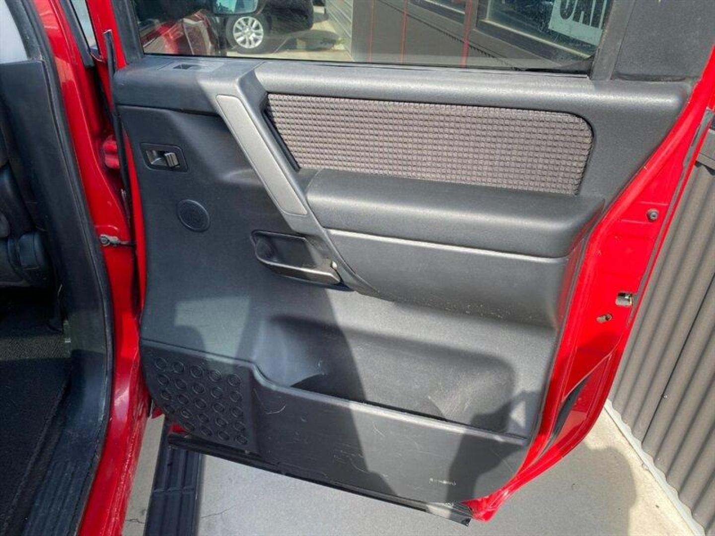 2010 Red Nissan Titan SE (1N6AA0EC2AN) with an 5.6L V8 317hp 385ft. lbs. engine, Automatic transmission, located at 842 E South Street, Powell, WY, 82435, (307) 754-7289, 44.752300, -108.746933 - Photo#11