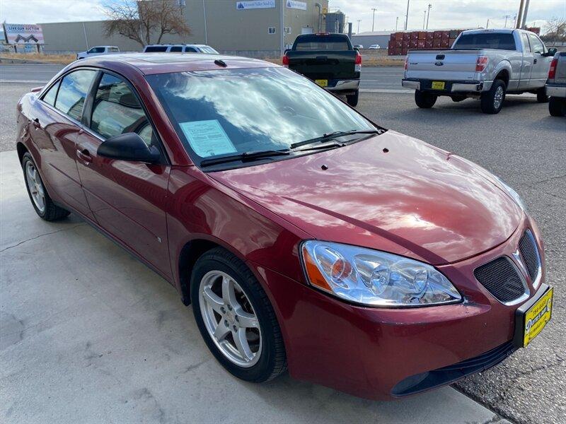 2009 Performance Red Metallic Pontiac G6 (1G2ZG57N594) with an 3.5L V6 219hp 219ft. lbs. engine, Automatic transmission, located at 842 E South Street, Powell, WY, 82435, (307) 754-7289, 44.752300, -108.746933- Photo#1