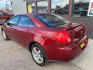2009 Performance Red Metallic Pontiac G6 (1G2ZG57N594) with an 3.5L V6 219hp 219ft. lbs. engine, Automatic transmission, located at 842 E South Street, Powell, WY, 82435, (307) 754-7289, 44.752300, -108.746933 - Photo#3