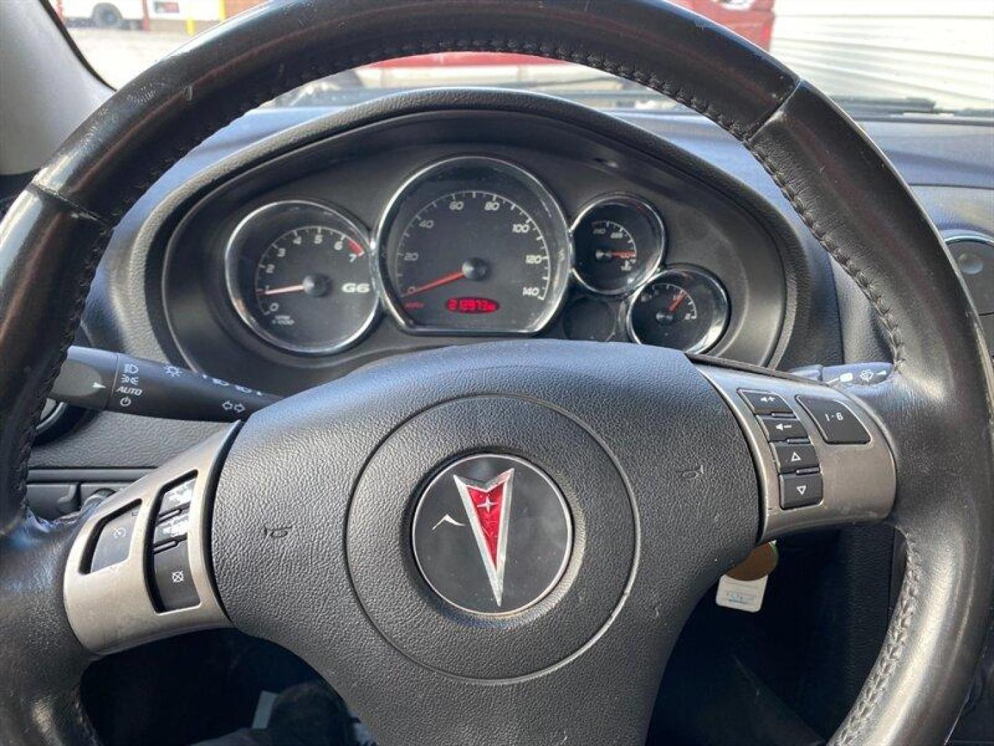 2009 Performance Red Metallic Pontiac G6 (1G2ZG57N594) with an 3.5L V6 219hp 219ft. lbs. engine, Automatic transmission, located at 842 E South Street, Powell, WY, 82435, (307) 754-7289, 44.752300, -108.746933 - Photo#8