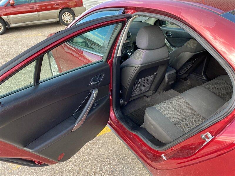2009 Performance Red Metallic Pontiac G6 (1G2ZG57N594) with an 3.5L V6 219hp 219ft. lbs. engine, Automatic transmission, located at 842 E South Street, Powell, WY, 82435, (307) 754-7289, 44.752300, -108.746933- Photo#10