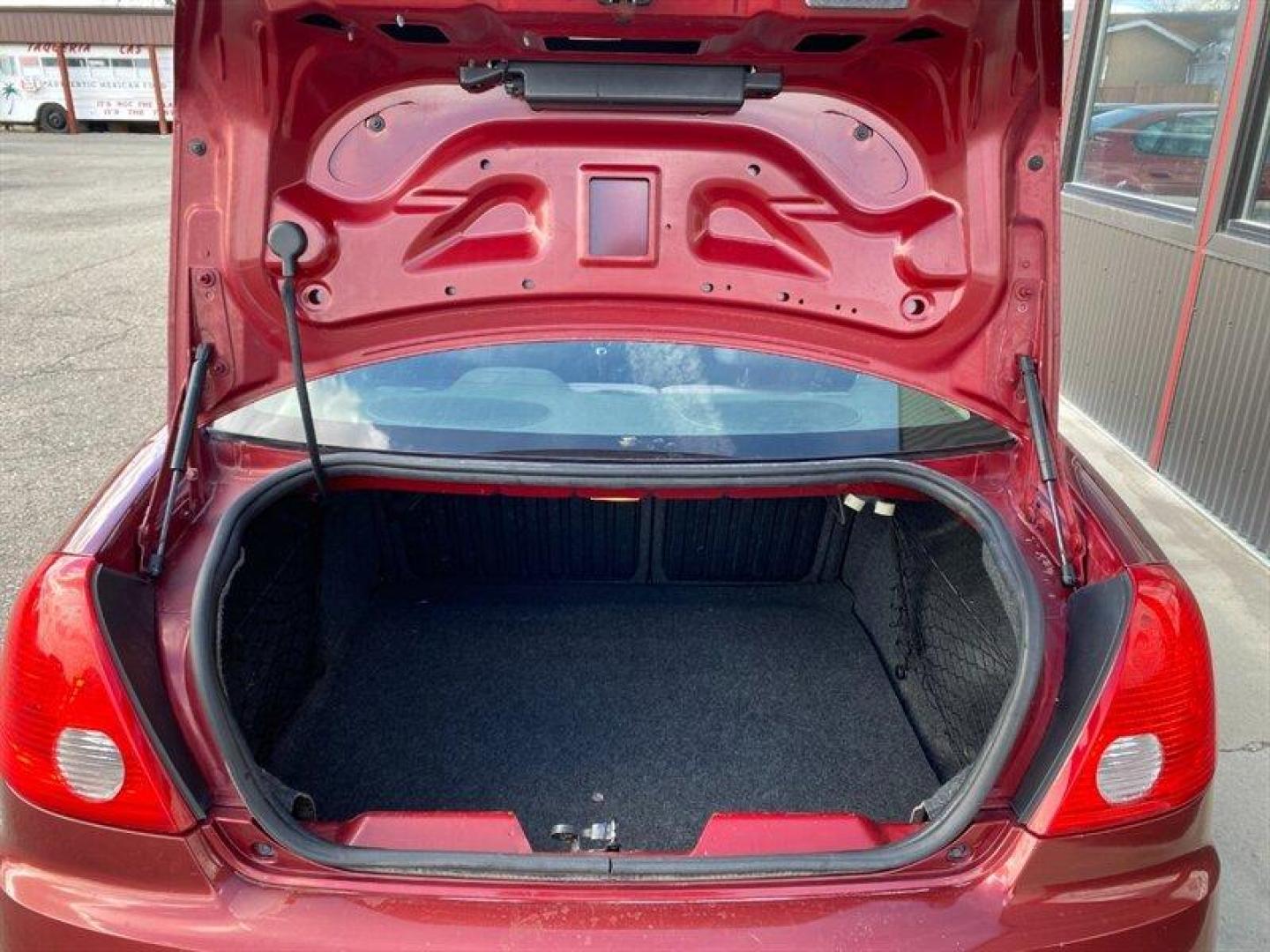 2009 Performance Red Metallic Pontiac G6 (1G2ZG57N594) with an 3.5L V6 219hp 219ft. lbs. engine, Automatic transmission, located at 842 E South Street, Powell, WY, 82435, (307) 754-7289, 44.752300, -108.746933 - Photo#13