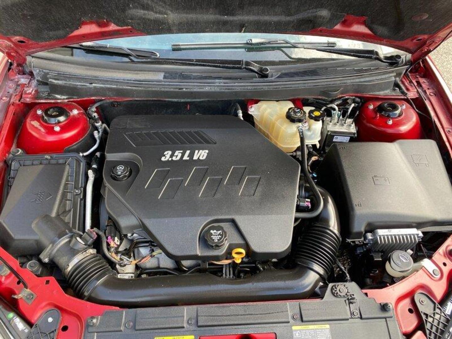 2009 Performance Red Metallic Pontiac G6 (1G2ZG57N594) with an 3.5L V6 219hp 219ft. lbs. engine, Automatic transmission, located at 842 E South Street, Powell, WY, 82435, (307) 754-7289, 44.752300, -108.746933 - Photo#20