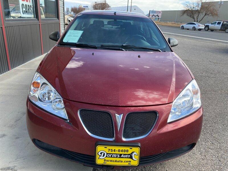 2009 Performance Red Metallic Pontiac G6 (1G2ZG57N594) with an 3.5L V6 219hp 219ft. lbs. engine, Automatic transmission, located at 842 E South Street, Powell, WY, 82435, (307) 754-7289, 44.752300, -108.746933- Photo#24