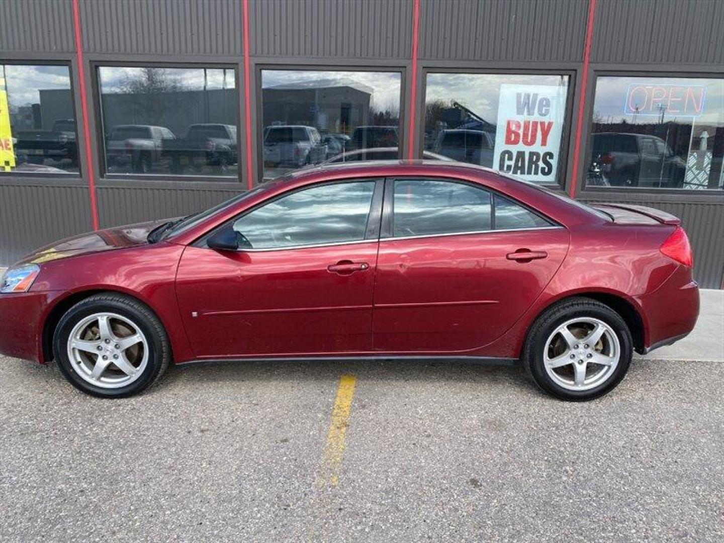 2009 Performance Red Metallic Pontiac G6 (1G2ZG57N594) with an 3.5L V6 219hp 219ft. lbs. engine, Automatic transmission, located at 842 E South Street, Powell, WY, 82435, (307) 754-7289, 44.752300, -108.746933 - Photo#26