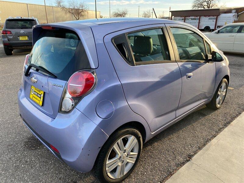2015 Denim Metallic Chevrolet Spark 1LT CVT (KL8CD6S99FC) with an Ecotec 1.2L I4 84hp 83ft. lbs. engine, Automatic transmission, located at 842 E South Street, Powell, WY, 82435, (307) 754-7289, 44.752300, -108.746933- Photo#2