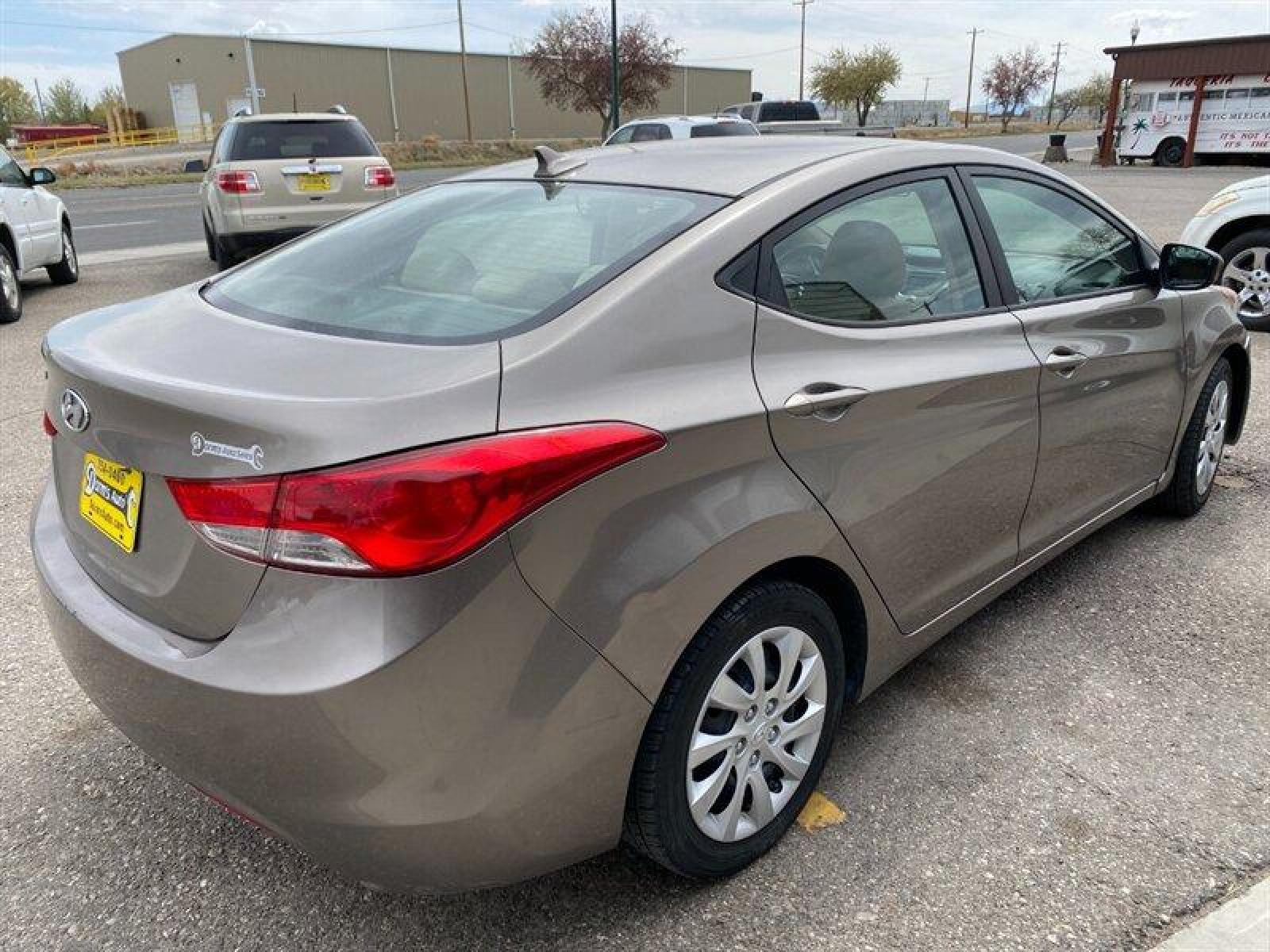 2011 Tan Hyundai ELANTRA GLS (5NPDH4AE5BH) with an 1.8L I4 148hp 131ft. lbs. engine, 6 Speed Manual transmission, located at 842 E South Street, Powell, WY, 82435, (307) 754-7289, 44.752300, -108.746933 - Photo #2