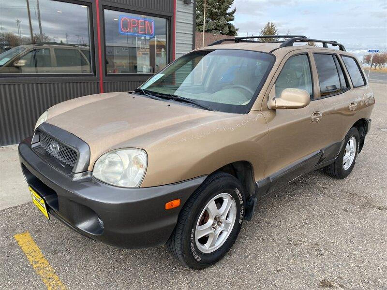 2003 Gold Hyundai SANTA FE (KM8SB12BX3U) with an 2.4L I4 138hp 147ft. lbs. engine, 5 Speed Manual transmission, located at 842 E South Street, Powell, WY, 82435, (307) 754-7289, 44.752300, -108.746933 - Photo #0