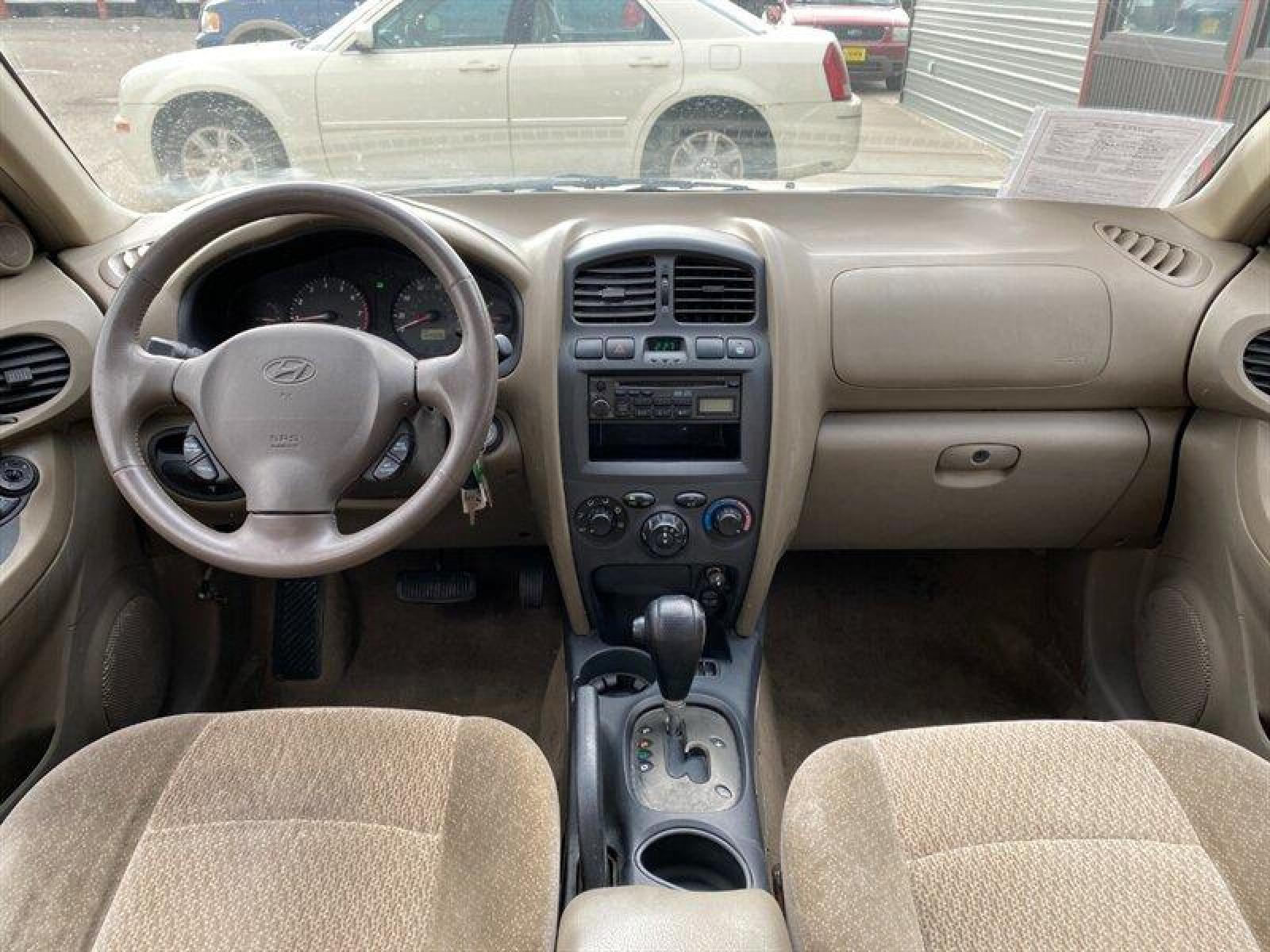 2003 Gold Hyundai SANTA FE (KM8SB12BX3U) with an 2.4L I4 138hp 147ft. lbs. engine, 5 Speed Manual transmission, located at 842 E South Street, Powell, WY, 82435, (307) 754-7289, 44.752300, -108.746933 - Photo #10