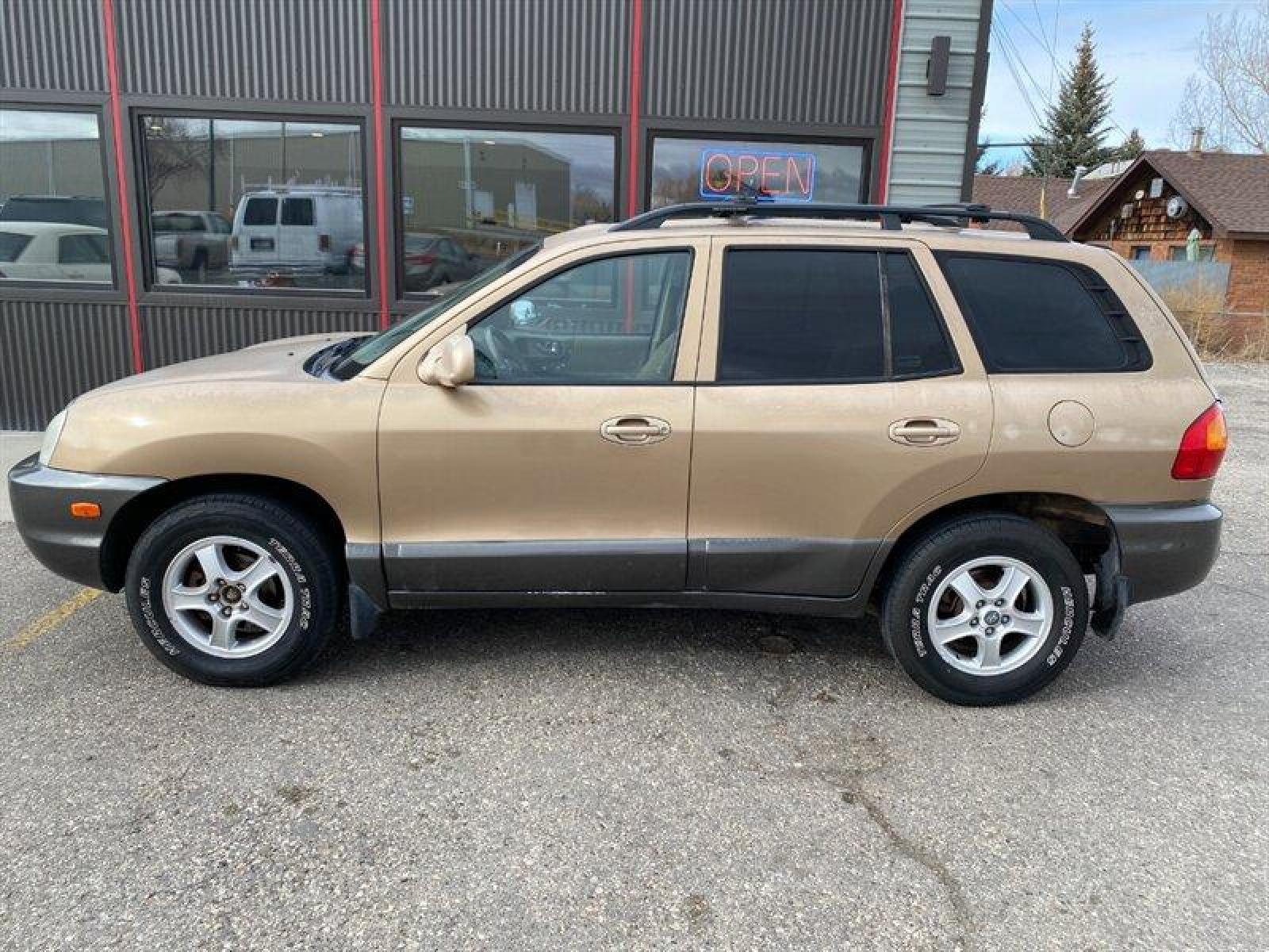 2003 Gold Hyundai SANTA FE (KM8SB12BX3U) with an 2.4L I4 138hp 147ft. lbs. engine, 5 Speed Manual transmission, located at 842 E South Street, Powell, WY, 82435, (307) 754-7289, 44.752300, -108.746933 - Photo #27