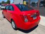 2013 Crystal Red Tintcoat Chevrolet Sonic LT Auto (1G1JC5SH5D4) with an Ecotec 1.8L I4 138hp 125ft. lbs. engine, Automatic transmission, located at 842 E South Street, Powell, WY, 82435, (307) 754-7289, 44.752300, -108.746933 - Photo#3