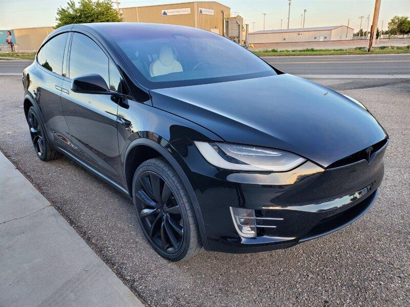 2019 Solid Black Tesla Model X Performance (5YJXCBE46KF) with an Electric 762hp 730ft. lbs. engine, Automatic transmission, located at 842 E South Street, Powell, WY, 82435, (307) 754-7289, 44.752300, -108.746933- Photo#1
