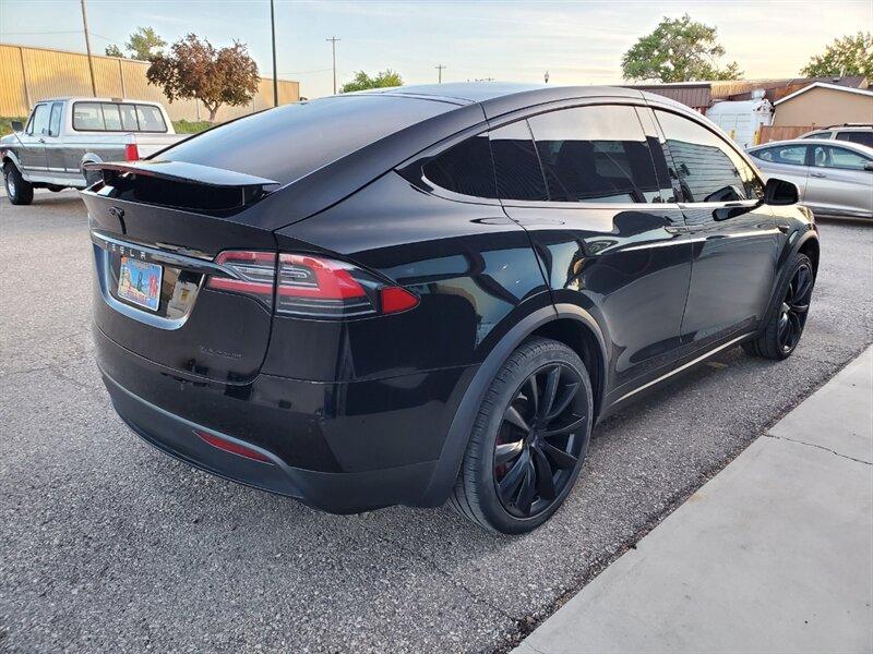 2019 Solid Black Tesla Model X Performance (5YJXCBE46KF) with an Electric 762hp 730ft. lbs. engine, Automatic transmission, located at 842 E South Street, Powell, WY, 82435, (307) 754-7289, 44.752300, -108.746933- Photo#2