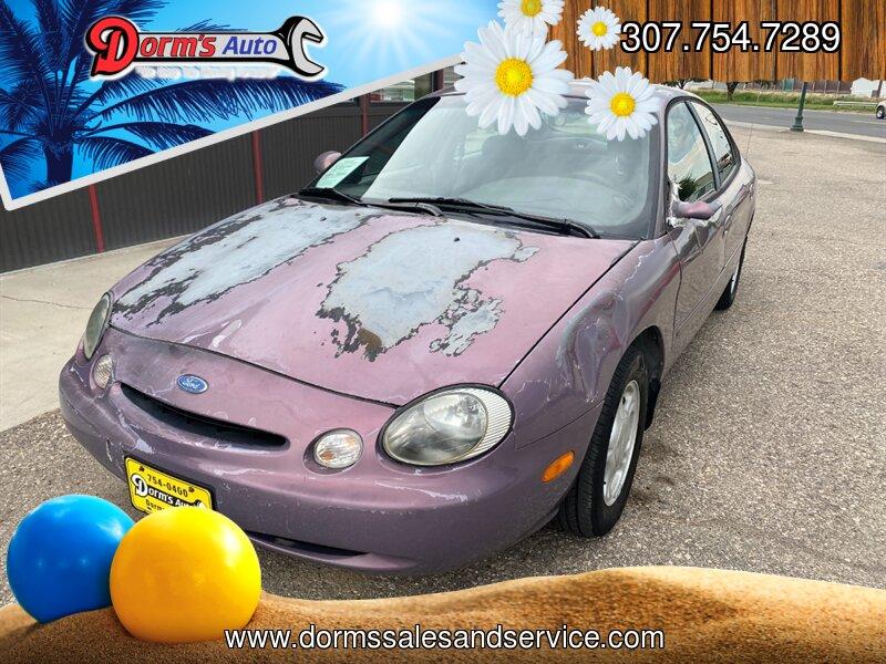 1996 Midnight Red Clearcoat Metallic Ford Taurus GL (1FALP52U2TA) with an 3.0L V6 145hp 170ft. lbs. engine, Automatic transmission, located at 842 E South Street, Powell, WY, 82435, (307) 754-7289, 44.752300, -108.746933- Photo#0