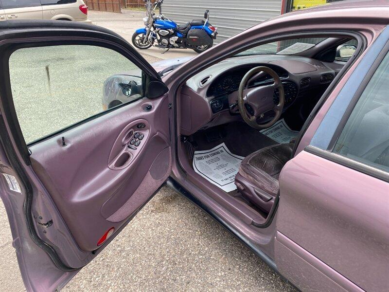 1996 Midnight Red Clearcoat Metallic Ford Taurus GL (1FALP52U2TA) with an 3.0L V6 145hp 170ft. lbs. engine, Automatic transmission, located at 842 E South Street, Powell, WY, 82435, (307) 754-7289, 44.752300, -108.746933- Photo#4