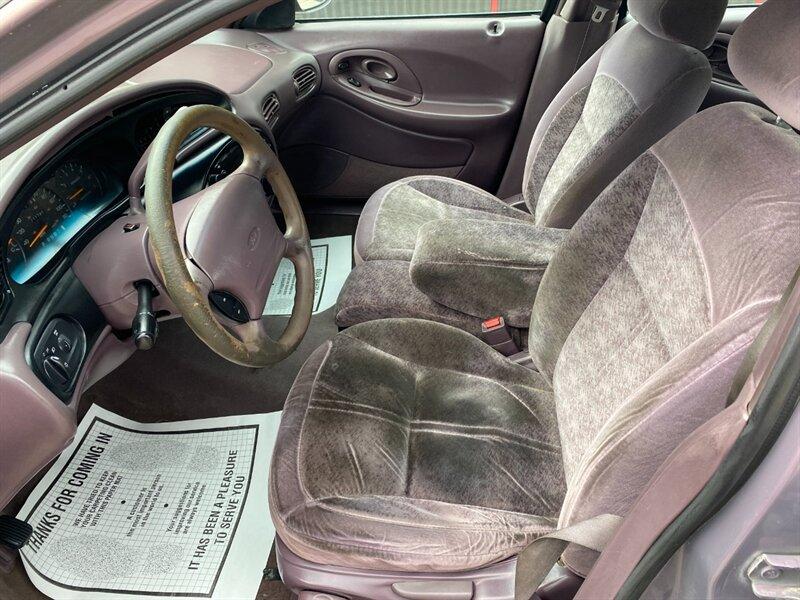 1996 Midnight Red Clearcoat Metallic Ford Taurus GL (1FALP52U2TA) with an 3.0L V6 145hp 170ft. lbs. engine, Automatic transmission, located at 842 E South Street, Powell, WY, 82435, (307) 754-7289, 44.752300, -108.746933- Photo#6
