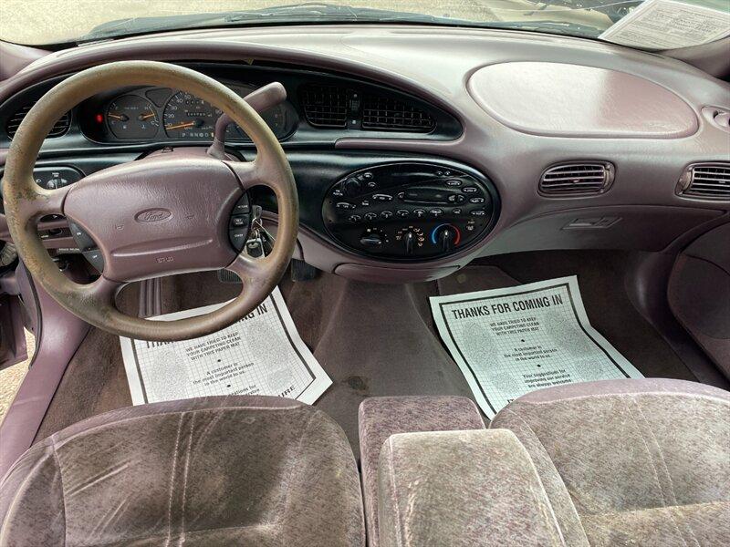 1996 Midnight Red Clearcoat Metallic Ford Taurus GL (1FALP52U2TA) with an 3.0L V6 145hp 170ft. lbs. engine, Automatic transmission, located at 842 E South Street, Powell, WY, 82435, (307) 754-7289, 44.752300, -108.746933- Photo#9
