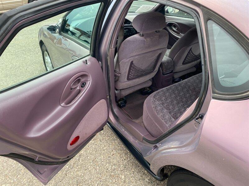 1996 Midnight Red Clearcoat Metallic Ford Taurus GL (1FALP52U2TA) with an 3.0L V6 145hp 170ft. lbs. engine, Automatic transmission, located at 842 E South Street, Powell, WY, 82435, (307) 754-7289, 44.752300, -108.746933- Photo#11