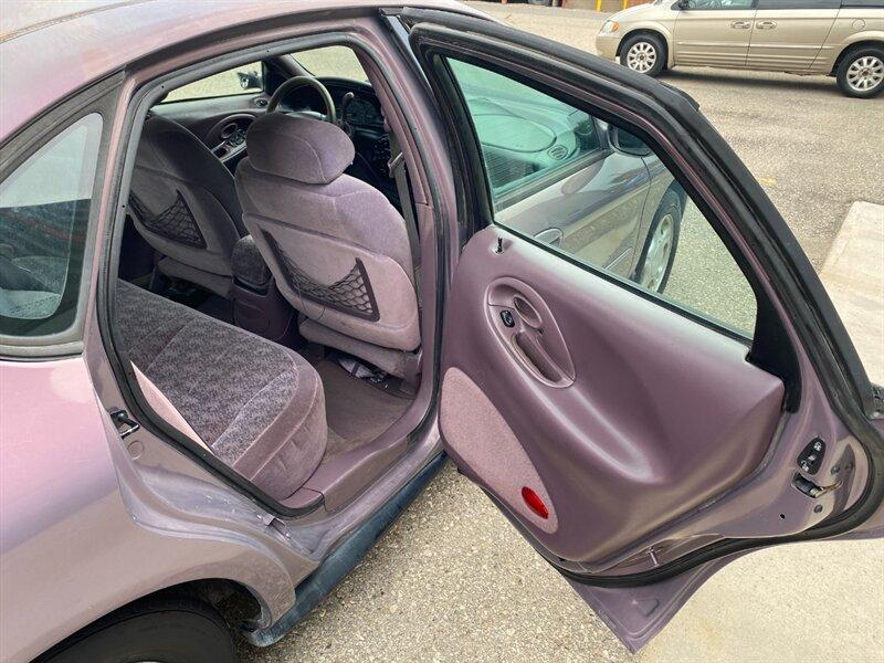 1996 Midnight Red Clearcoat Metallic Ford Taurus GL (1FALP52U2TA) with an 3.0L V6 145hp 170ft. lbs. engine, Automatic transmission, located at 842 E South Street, Powell, WY, 82435, (307) 754-7289, 44.752300, -108.746933- Photo#14