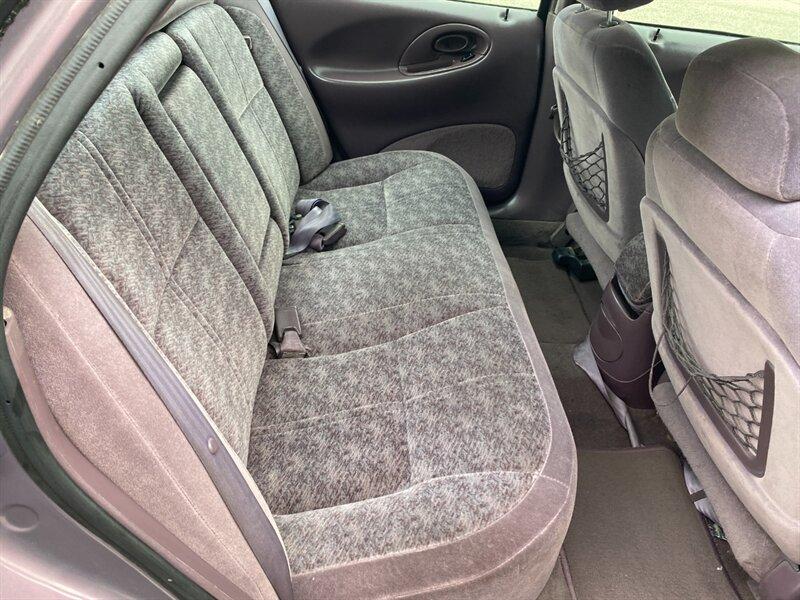 1996 Midnight Red Clearcoat Metallic Ford Taurus GL (1FALP52U2TA) with an 3.0L V6 145hp 170ft. lbs. engine, Automatic transmission, located at 842 E South Street, Powell, WY, 82435, (307) 754-7289, 44.752300, -108.746933- Photo#16