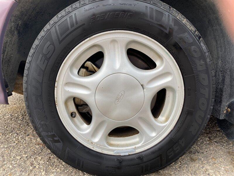 1996 Midnight Red Clearcoat Metallic Ford Taurus GL (1FALP52U2TA) with an 3.0L V6 145hp 170ft. lbs. engine, Automatic transmission, located at 842 E South Street, Powell, WY, 82435, (307) 754-7289, 44.752300, -108.746933- Photo#22