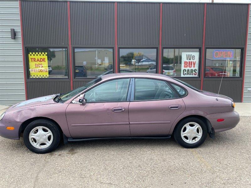 1996 Midnight Red Clearcoat Metallic Ford Taurus GL (1FALP52U2TA) with an 3.0L V6 145hp 170ft. lbs. engine, Automatic transmission, located at 842 E South Street, Powell, WY, 82435, (307) 754-7289, 44.752300, -108.746933- Photo#25