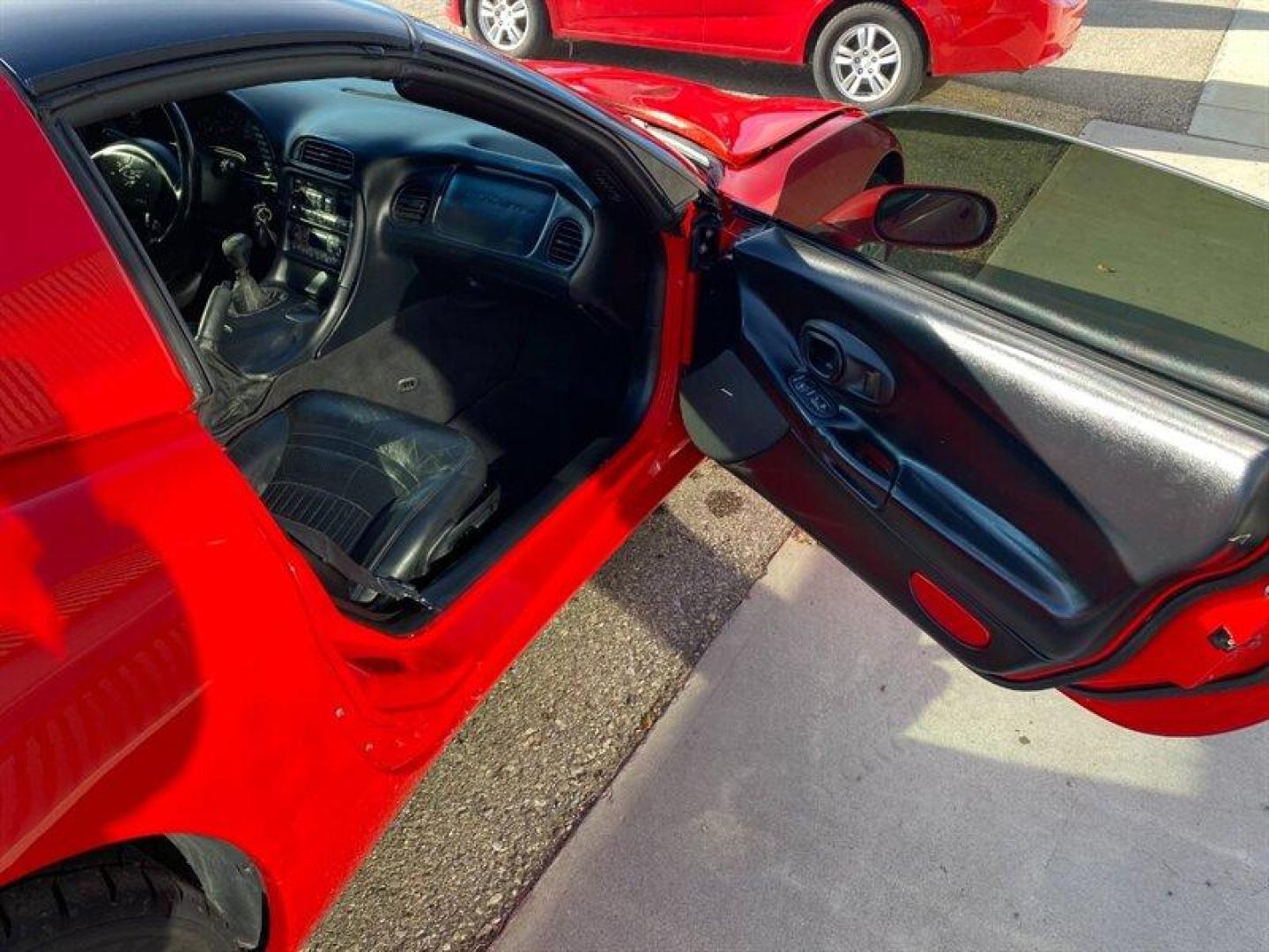 1997 Light Carmine Red Metallic Chevrolet Corvette (1G1YY22GXV5) with an 5L NA V8 overhead valves (OHV) 16V engine, Automatic transmission, located at 842 E South Street, Powell, WY, 82435, (307) 754-7289, 44.752300, -108.746933 - Photo#11