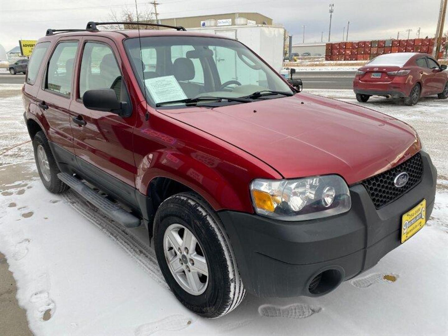 2007 Redfire Clearcoat Metallic Ford Escape XLS (1FMYU92Z17K) with an 2.3L inline 4 double overhead camshaft 16V engine, 5 Speed Manual transmission, located at 842 E South Street, Powell, WY, 82435, (307) 754-7289, 44.752300, -108.746933 - Photo#1
