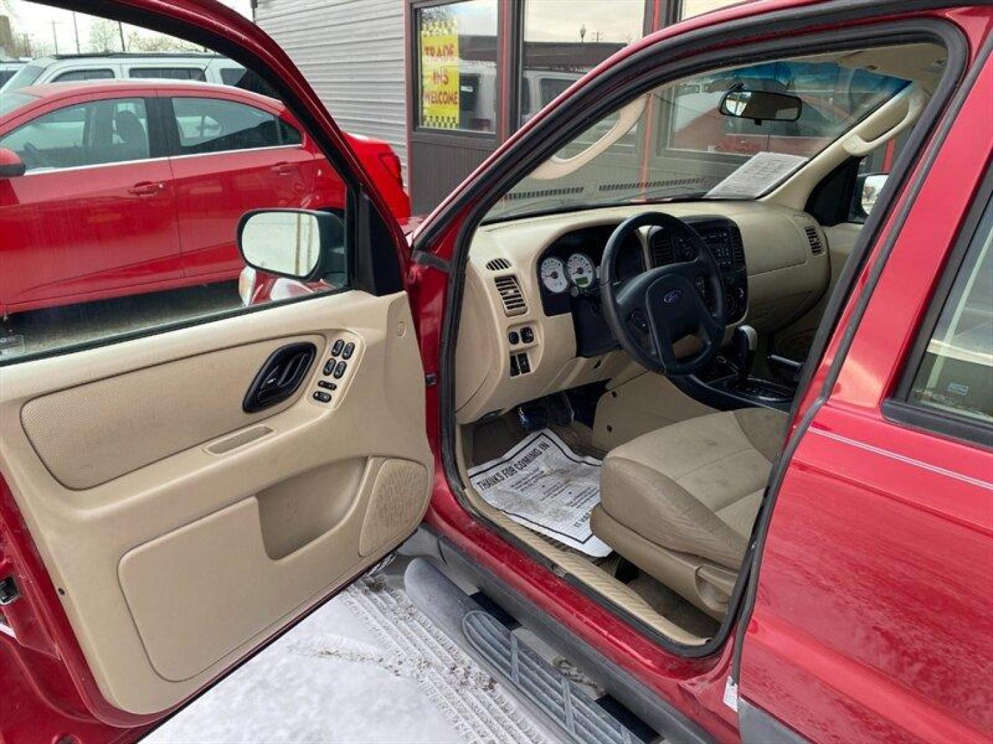 2007 Redfire Clearcoat Metallic Ford Escape XLS (1FMYU92Z17K) with an 2.3L inline 4 double overhead camshaft 16V engine, 5 Speed Manual transmission, located at 842 E South Street, Powell, WY, 82435, (307) 754-7289, 44.752300, -108.746933 - Photo#4