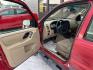 2007 Redfire Clearcoat Metallic Ford Escape XLS (1FMYU92Z17K) with an 2.3L inline 4 double overhead camshaft 16V engine, 5 Speed Manual transmission, located at 842 E South Street, Powell, WY, 82435, (307) 754-7289, 44.752300, -108.746933 - Photo#4