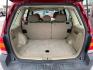 2007 Redfire Clearcoat Metallic Ford Escape XLS (1FMYU92Z17K) with an 2.3L inline 4 double overhead camshaft 16V engine, 5 Speed Manual transmission, located at 842 E South Street, Powell, WY, 82435, (307) 754-7289, 44.752300, -108.746933 - Photo#13
