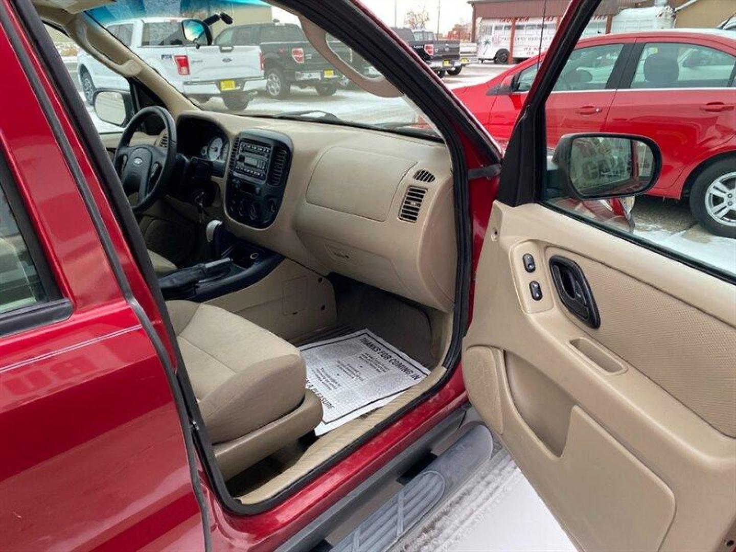 2007 Redfire Clearcoat Metallic Ford Escape XLS (1FMYU92Z17K) with an 2.3L inline 4 double overhead camshaft 16V engine, 5 Speed Manual transmission, located at 842 E South Street, Powell, WY, 82435, (307) 754-7289, 44.752300, -108.746933 - Photo#18