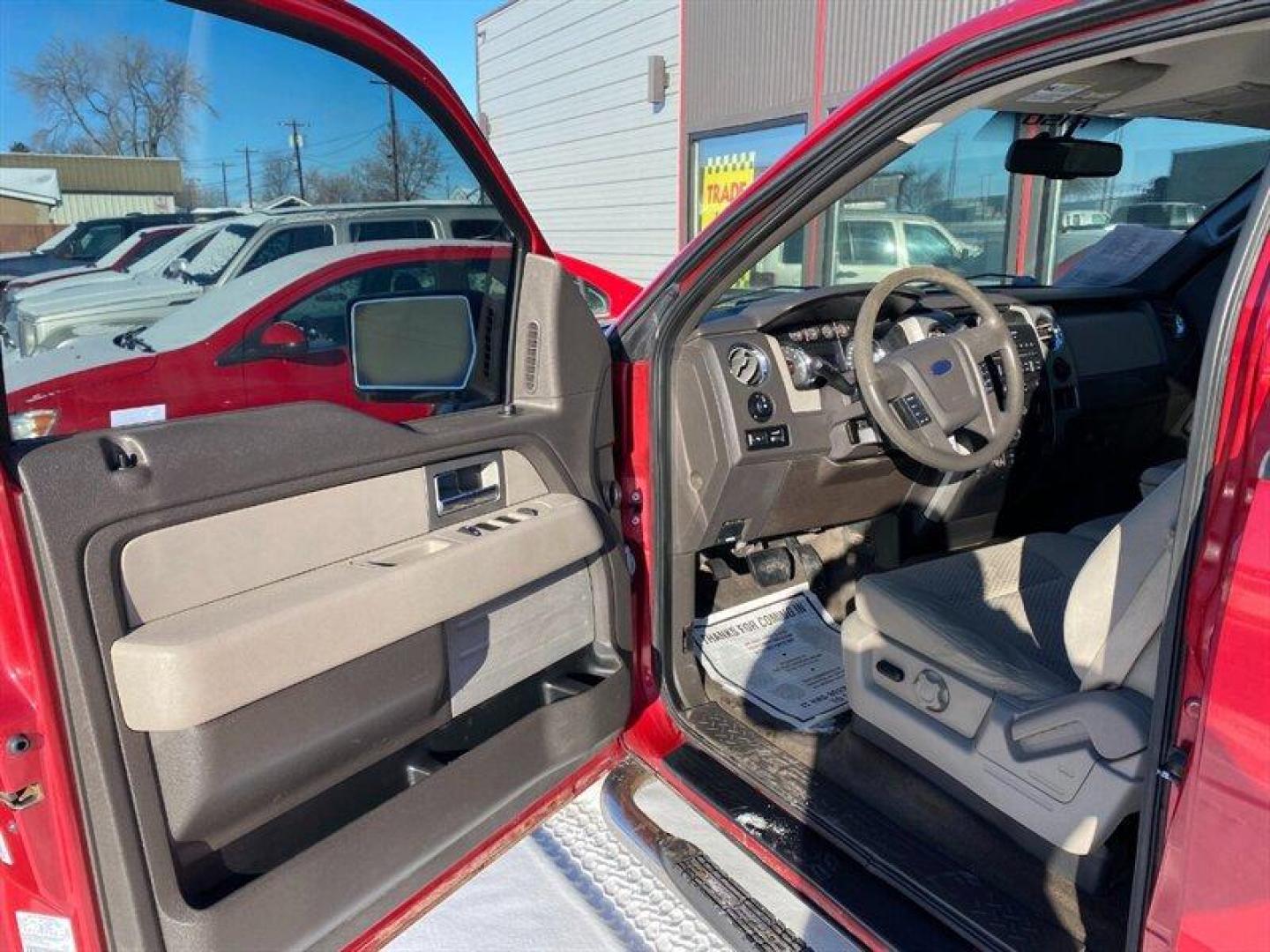 2009 Royal Red Clearcoat Metallic Ford F-150 XL (1FTPW14V19F) with an Triton 5.4L Flex Fuel V8 320hp 390ft. lbs. engine, Automatic transmission, located at 842 E South Street, Powell, WY, 82435, (307) 754-7289, 44.752300, -108.746933 - Photo#4