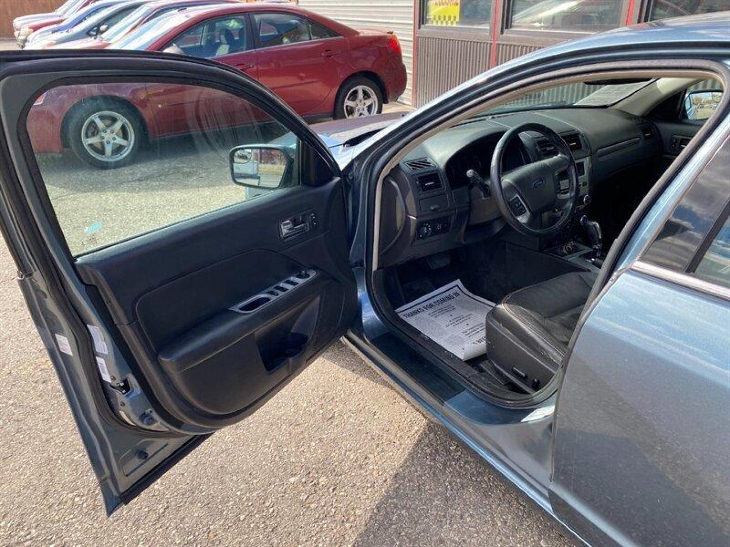 2012 Steel Blue Metallic Ford Fusion SEL (3FAHP0JAXCR) with an 2.5L I4 175hp 172ft. lbs. engine, Automatic transmission, located at 842 E South Street, Powell, WY, 82435, (307) 754-7289, 44.752300, -108.746933 - Photo#4