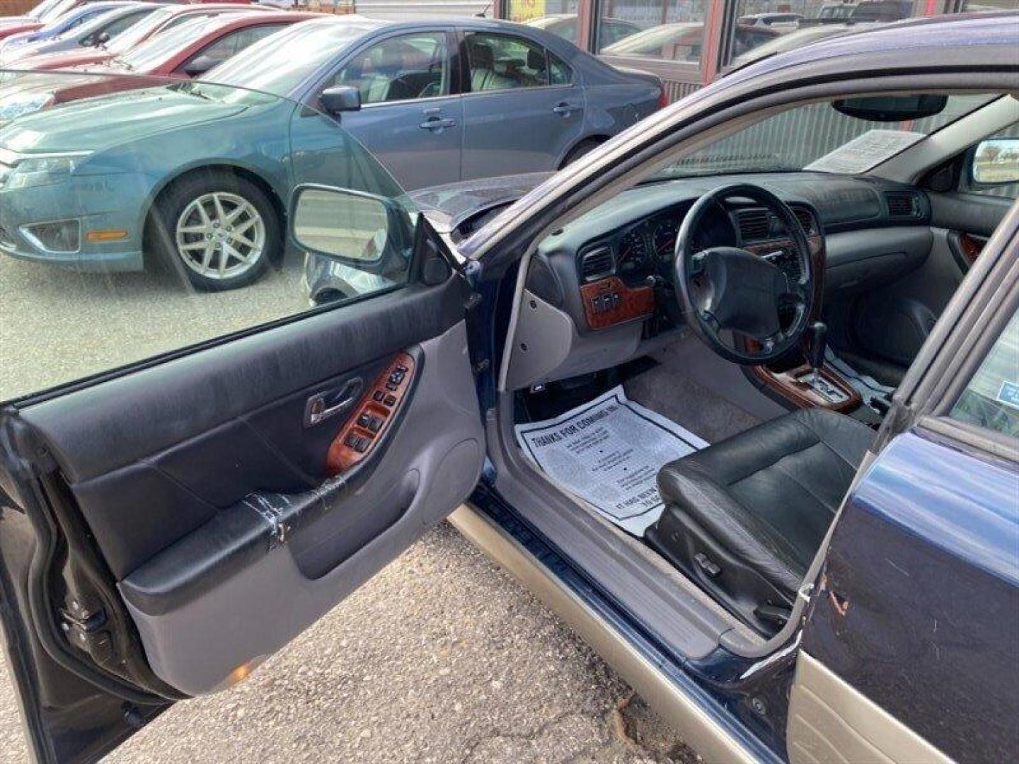 2004 Blue Subaru Outback Limited (4S3BE686347) with an 2L NA H4 single overhead cam (SOHC) 16V engine, Automatic transmission, located at 842 E South Street, Powell, WY, 82435, (307) 754-7289, 44.752300, -108.746933 - Photo#4