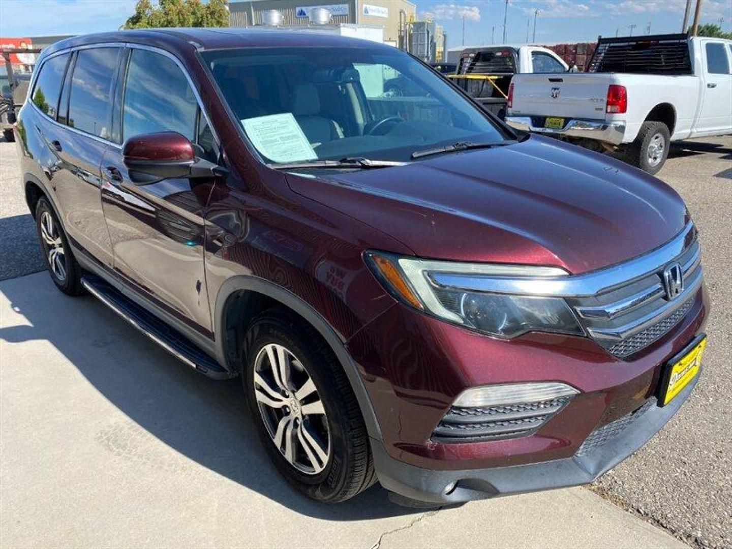 2016 Burgundy Honda Pilot EX-L (5FNYF5H5XGB) with an 3.5L V6 280hp 262ft. lbs. engine, 6-Speed Shiftable Au transmission, located at 842 E South Street, Powell, WY, 82435, (307) 754-7289, 44.752300, -108.746933 - Photo#1