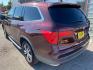 2016 Burgundy Honda Pilot EX-L (5FNYF5H5XGB) with an 3.5L V6 280hp 262ft. lbs. engine, 6-Speed Shiftable Au transmission, located at 842 E South Street, Powell, WY, 82435, (307) 754-7289, 44.752300, -108.746933 - Photo#3