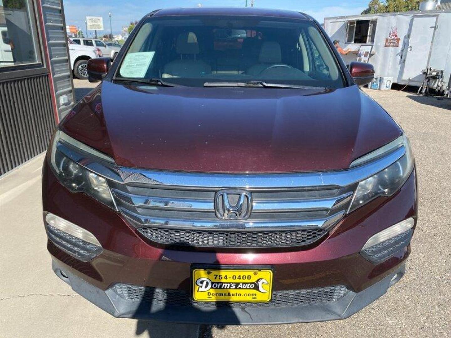 2016 Burgundy Honda Pilot EX-L (5FNYF5H5XGB) with an 3.5L V6 280hp 262ft. lbs. engine, 6-Speed Shiftable Au transmission, located at 842 E South Street, Powell, WY, 82435, (307) 754-7289, 44.752300, -108.746933 - Photo#20