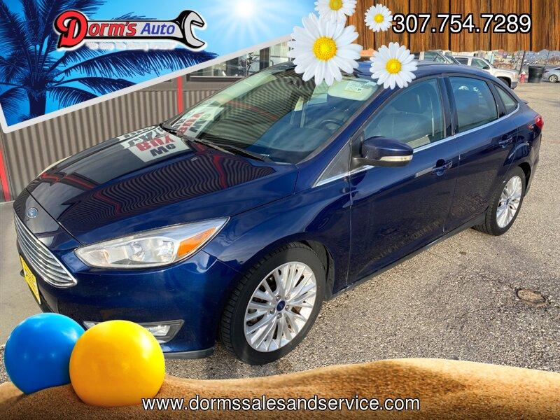 2017 Kona Blue Ford Focus Titanium (1FADP3J25HL) with an 2.0L Flex Fuel I4 160hp 146ft. lbs. engine, Automatic transmission, located at 842 E South Street, Powell, WY, 82435, (307) 754-7289, 44.752300, -108.746933- Photo#0